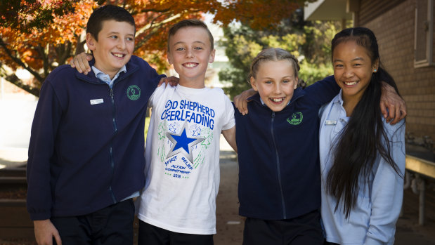Rory Grummett (second from left) with his Good Shepherd Primary School year six classmates and fellow cheerleaders (l-r) Brady Bryant, Laura Henssen and Ashleigh Nguyen.