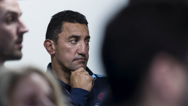 Time to go: Daryl Gibson watches on as Waratahs boss Andrew Hore addresses the media in the wake of the coach's departure.