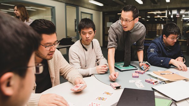 Eddie Woo in his element, running a special workshop for specialist maths students at Hawker College in Canberra