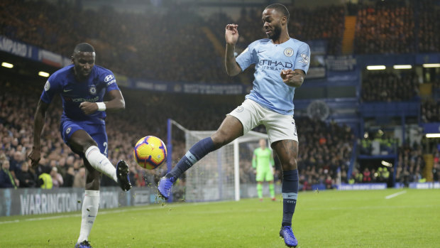 Chelsea's Antonio Rudiger and Manchester City's Raheem Sterling compete for the ball on Saturday. 
