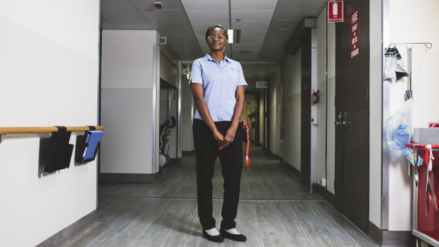 Registered nurse Nju Bongbeng in the corridor of the revamped maternity ward at Calvery Public.