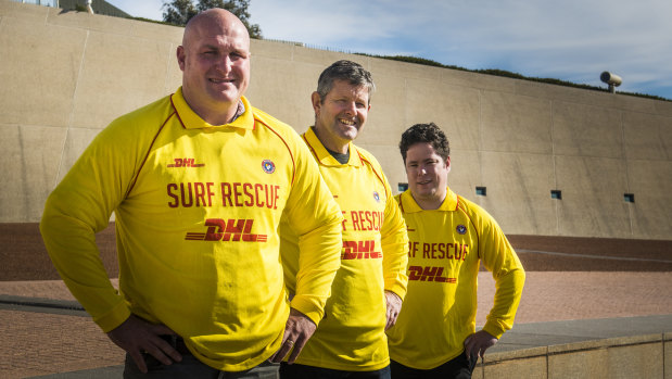Michael Weyman, Shaun Pike and Andrew Edmunds, who received the Surf Lifesaving Australia national rescue of the month award for March at Parliament House on Thursday.