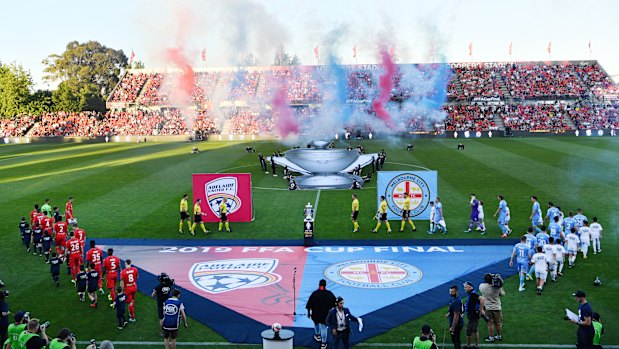 Grand finale: Adelaide and Melbourne City players prepare for kick-off.