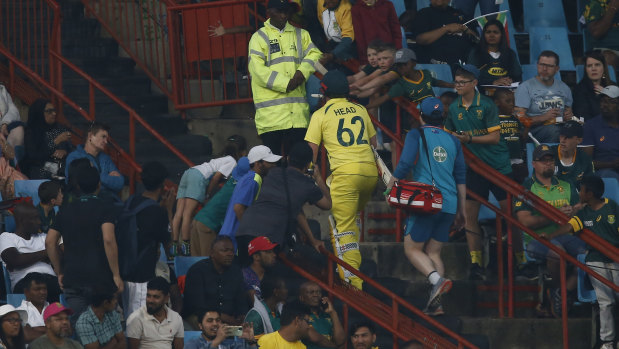 Travis Head leaves the field after breaking his hand against South Africa in Pretoria last month,