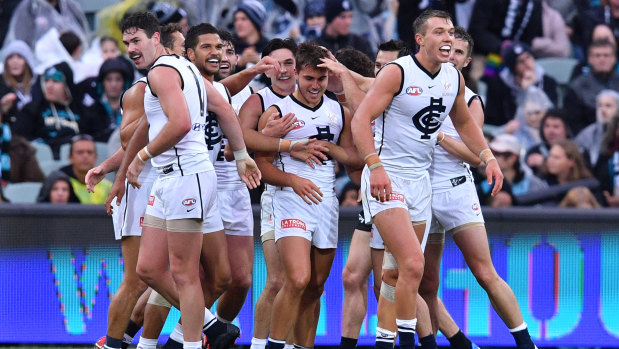 Blues players celebrate a goal.