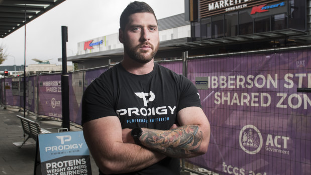 Cam McAlister, owner of Prodigy Supplements says the Gungahlin town centre has become a ghost town because of the light rail construction noise and hoarding. He recorded noise of 93 decibels with all of his shop doors closed. 