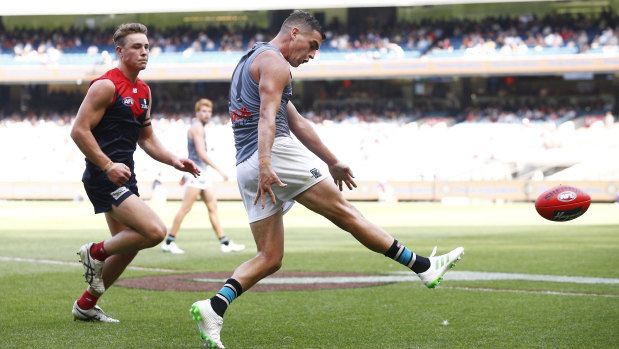 Powering up: Tom Rockliff was a big influence for Port Adelaide against Melbourne.