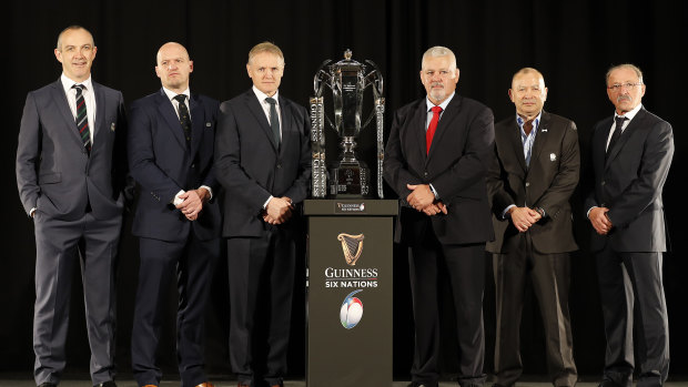 Detente: The Six Nations coaches pose at the season launch. From left, Scotland's Gregor Townsend, Italy's Conor O'Shea, Ireland's Joe Schmidt, Wales' Warren Gatland, England's Eddie Jones and France's Jacques Brunel.