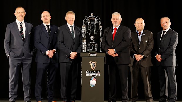 Detente: The Six Nations coaches pose at the season launch. From left, Scotland's Gregor Townsend, Italy's Conor O'Shea, Ireland's Joe Schmidt, Wales' Warren Gatland, England's Eddie Jones and France's Jacques Brunel.