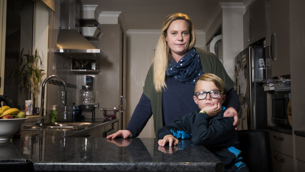 Renee Creech with her son Cody, 9, who was eating two-minute noodles when he accidentally burnt 15 per cent of his body. 