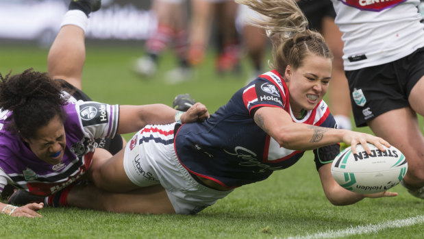 High standard: Isabelle Kelly scores for the Roosters against the Warriors on Saturday.
