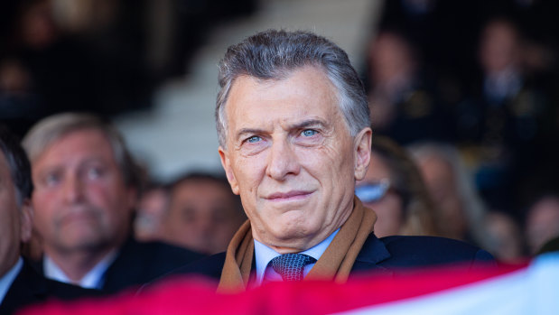 President Mauricio Macri re-imposed capital controls on Sunday as Argentina battled to avoid its ninth sovereign default.