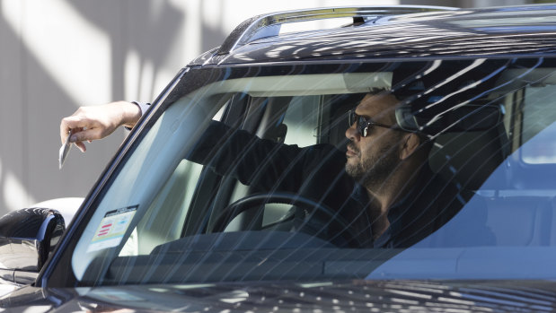 Checking out: Michael Cheika leaves the rugby headquarters at Moore Park on Saturday.
