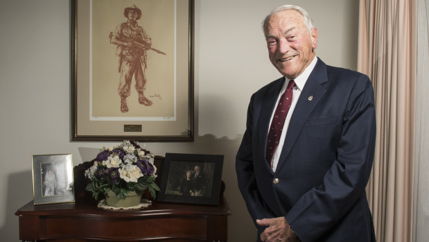 Major General Peter Phillips (Ret) was the commander of D Company, 3 RAR, during the battle of Coral Balmoral. He is pictured with an iconic image of a digger in New Guinea by Ivor Hele.