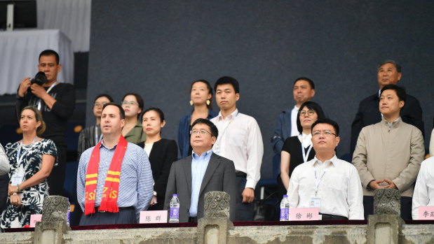 Trade Minister Steven Ciobo attends an AFL match between the Gold Coast Suns and the Port Adelaide Power at Jiangwan Stadium in Shanghai on Saturday.