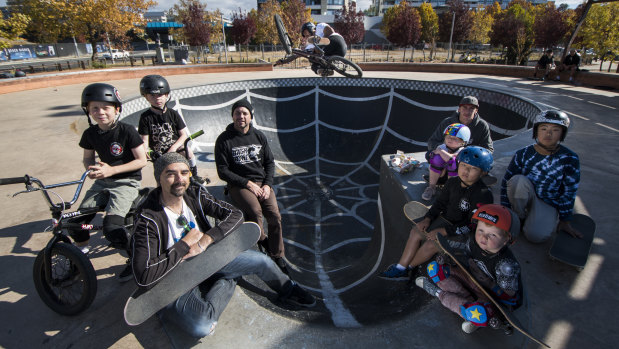 Riley and Toby Williams, Canberra Skateboarding Association president Tony Caruana, Freestyle ACT BMX Club president Rhys Williams, Tyson Jones-Peni, Freestyle ACT BMX Club vice president Cooper Murchie, Jaiden and Juan Kim, Savannah Murchie and Reece Ashton are not happy with a proposal for a KFC next to the Belconnen skate park.