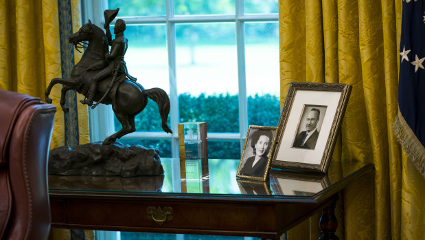 Portraits of President Donald Trump’s parents, Mary Anne MacLeod Trump and Fred Trump, in the Oval Office.