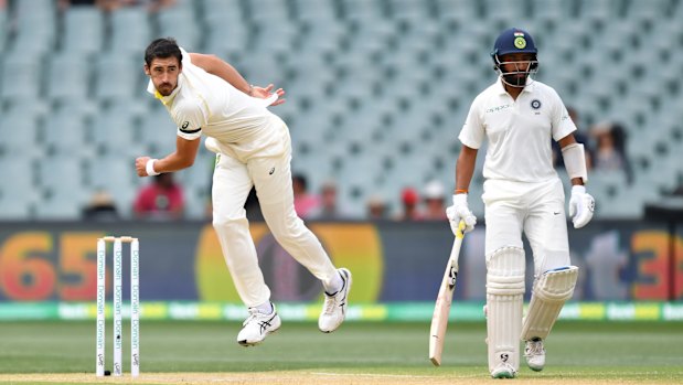 Wild: Mitchell Starc unleashes, with some misdirection, on day four at Adelaide.