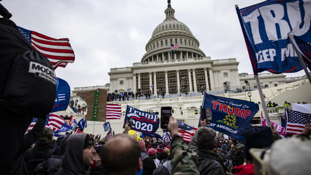 Pro-Trump supporters storm the US Capitol following a rally with President Donald Trump.