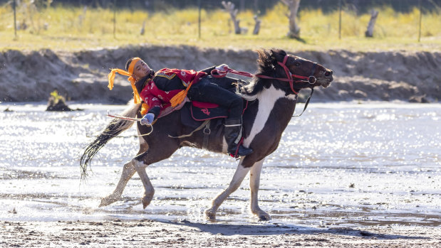 A Mongolian horseman at the Wulan Butong Grasslands. 