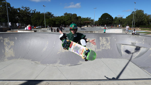 Skateboarders use the ramps at Pizzey Park on the Gold Coast.