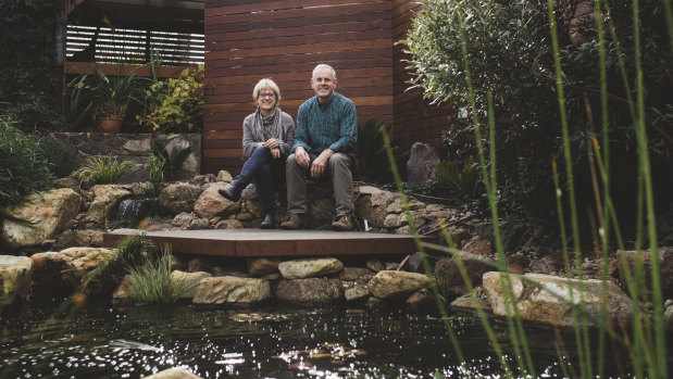 Christine and Warwick Finch in their garden. A series of open gardens will be held across the ACT and region to demonstrate best practice solutions for managing and treating stormwater and minimising contaminated run-off.