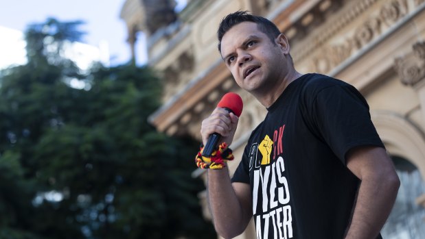 Actor Meyne Wyatt speaks at a rally on Saturday to mark 30 years since the royal commission.