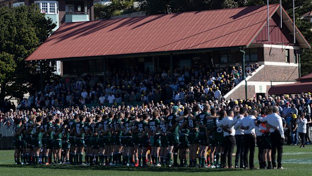 Players line up for the national anthems at Coogee Oval before a match between Randwick and Argentina in 2019.