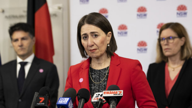 NSW Premier Gladys Berejiklian with Customer Service Minister Victor Dominello and Chief Health Officer Kerry Chant.