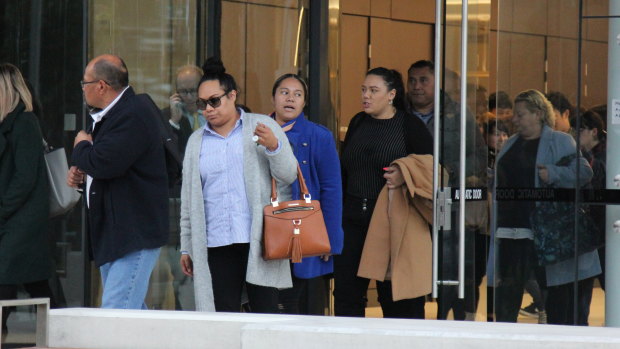 Family members of Epenesa Pahiva leave court on Tuesday.