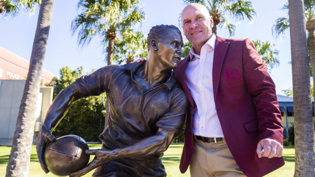 Alfie immortalised: Allan Langer with his new statue at Suncorp Stadium. Andrew Gee was a surprise attendee at the unveiling.