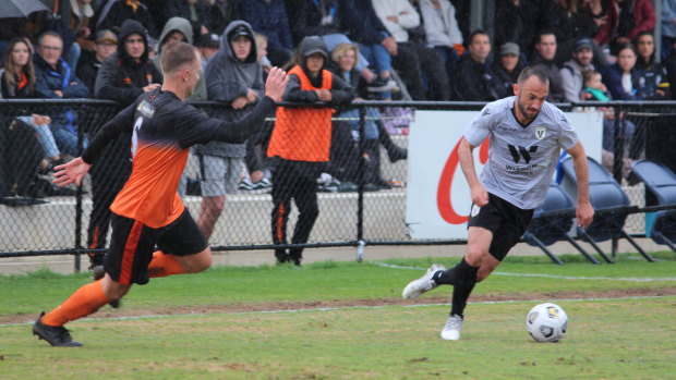 Macarthur FC defender Ivan Franjic takes the ball forward against Camden Tigers in the A-League club's inaugural pre-season outing.