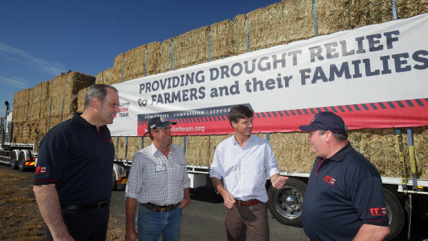 Rapid Relief Team chairman Merrick Grimshaw (left), farmer Tony Biffin, MP Angus Taylor and RRT director Ron Arkcoll. 