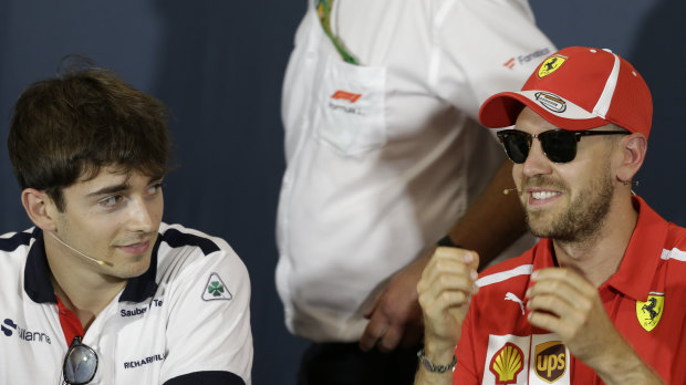 Future teammates: Leclerc doesn't expect to play second fiddle to Vettel (right).