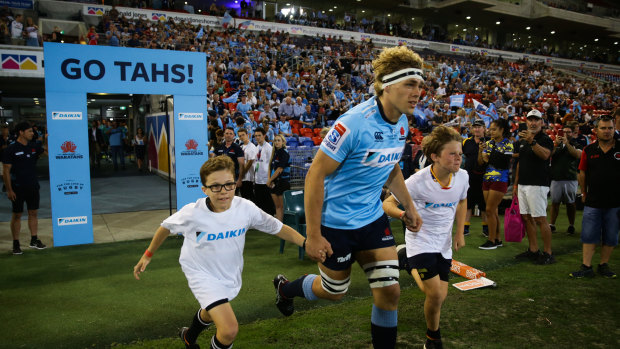 Ned Hanigan runs out in the Waratahs' last match in Newcastle, against the Sunwolves last year. 