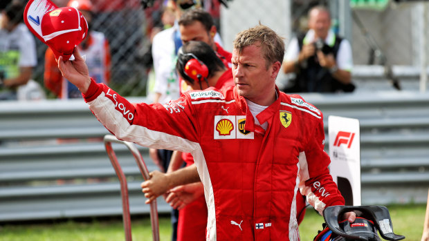 Character: Kimi Raikkonen acknowledges the crowd after taking pole for the Italian Grand Prix with the fastest lap in F1 history.