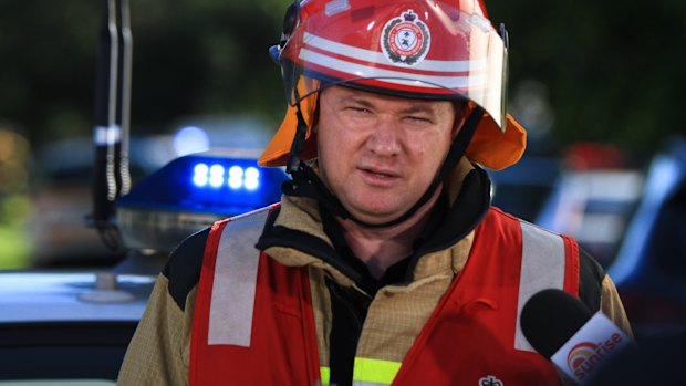 Queensland Fire and Emergency Service Inspector Bevan Moore addresses the media.