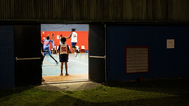 The team trains into the late evening in Shalvey, New South Wales. 