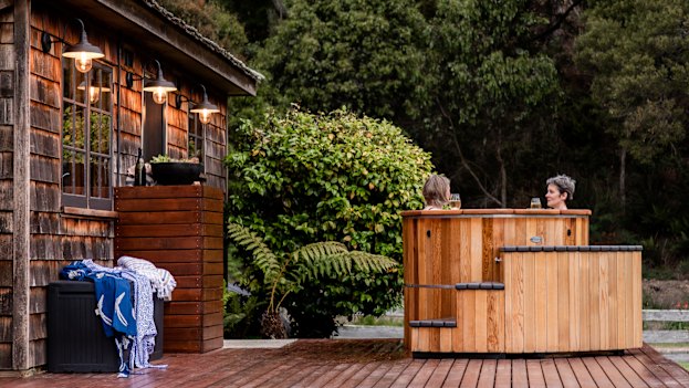 Set on a private deck, the Cedar Cottage hot tub fits four.