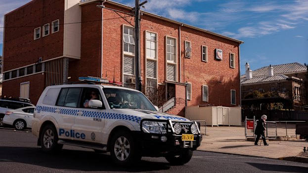 A police vehicle drives through the southern NSW town of Cooma, where 95-year-old Clare Nowland died after she was allegedly Tasered last week. 
