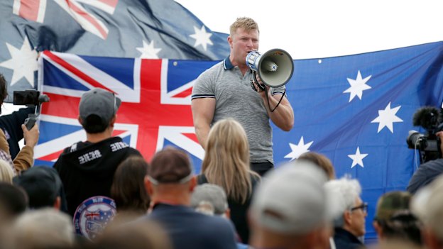 Right-wing figure Blair Cottrell addresses a rally in St Kilda. 