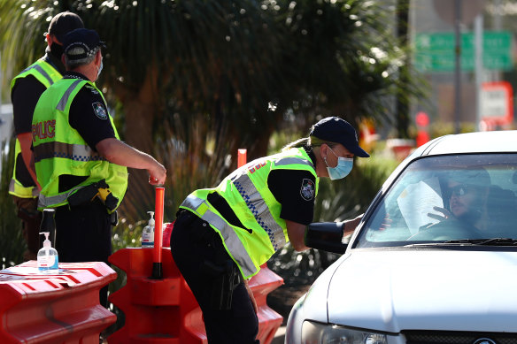 Police stop vehicles on the Queensland border at Coolangatta.