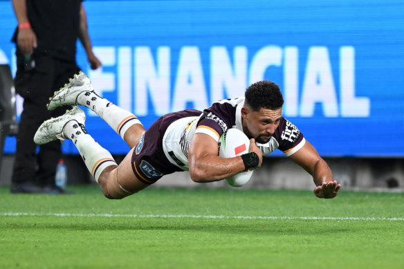 Gehamat Shibasaki scoring a try for the Broncos.