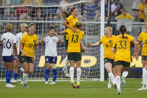 Matilda’s Leah Davidson, centre top, celebrates with teammates after scoring.