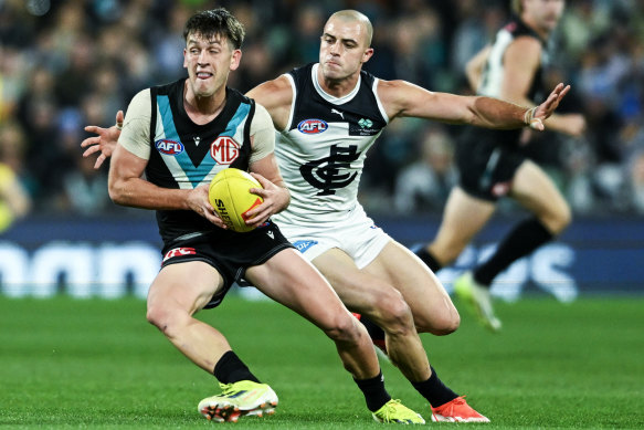 Carlton’s Alex Cincotta (right) is tagging on a weekly basis these days, including his role on Power star Zak Butters two weeks ago.