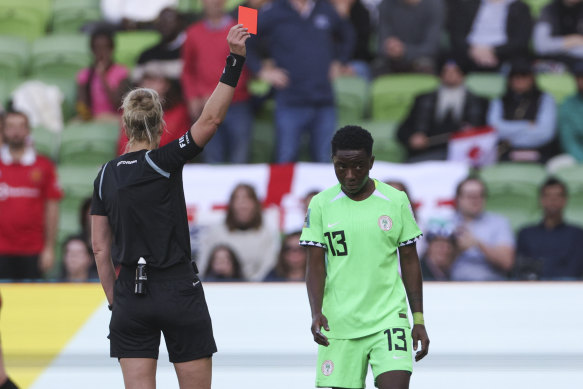 Nigeria’s Deborah Abiodun is shown a red card by referee Lina Lehtovaara.