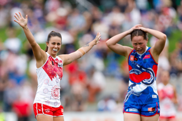 Swan Chloe Molloy celebrates a goal.