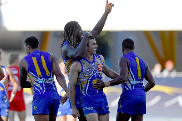 Jamie Cripps and Nic Naitanui celebrate a goal in the Eagles' win over Sydney.