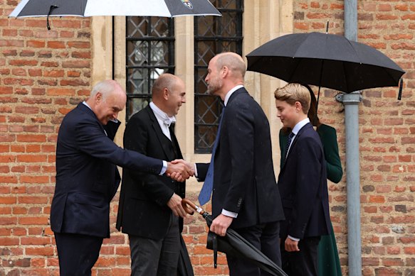 The royals are met by Eton headmaster Simon Henderson, second from left, and provost Nicholas Coleridge.