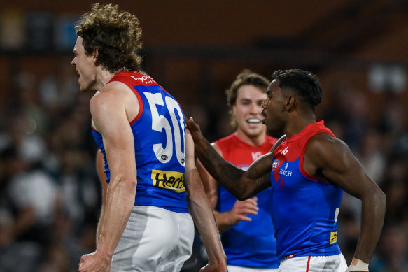 Ben Brown of the Demons  celebrates a goal.